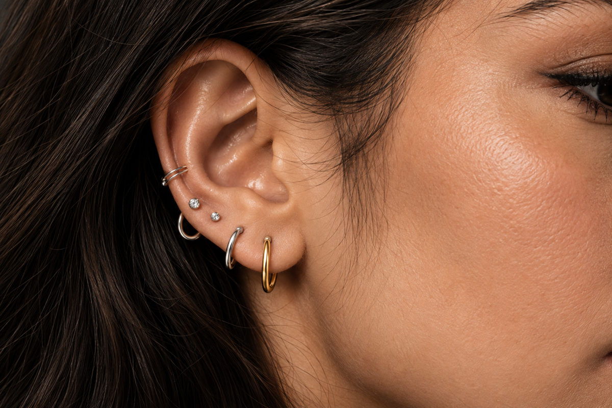 Ear styling with small hoops and studs