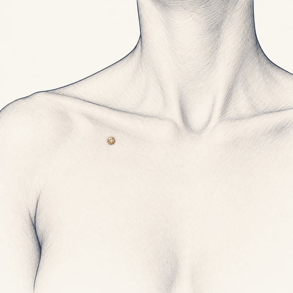 Anatomical pencil sketch showing a dermal jewel on the skin below the collarbone